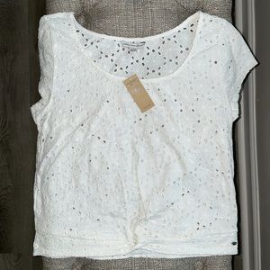 White top with tiny keyholes